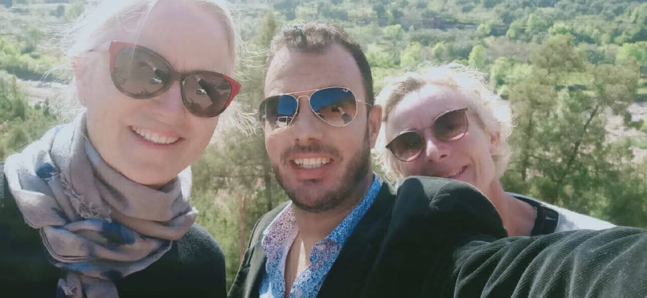 Local guide and travelers discovering Morocco
