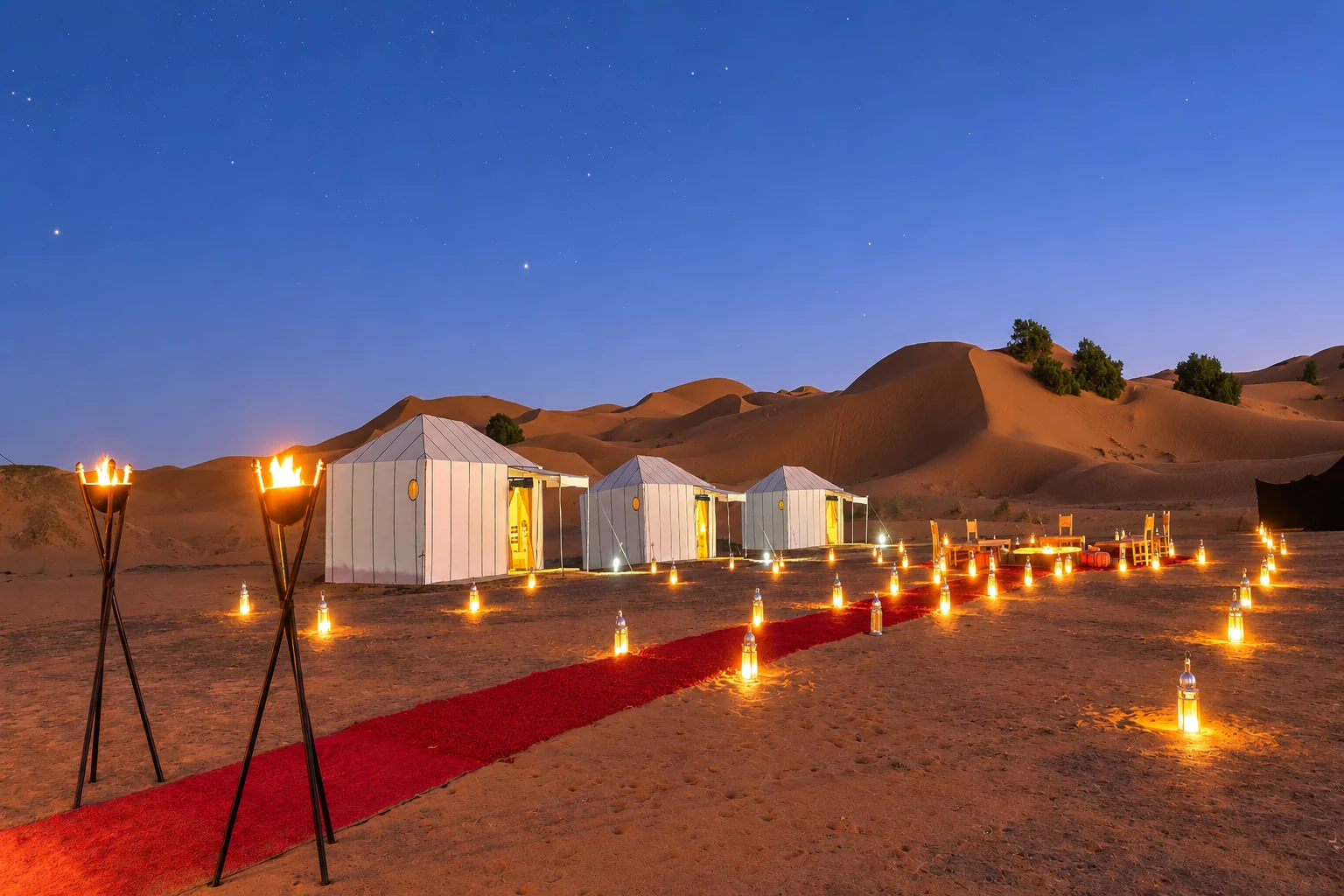 Lantern-lit desert camp