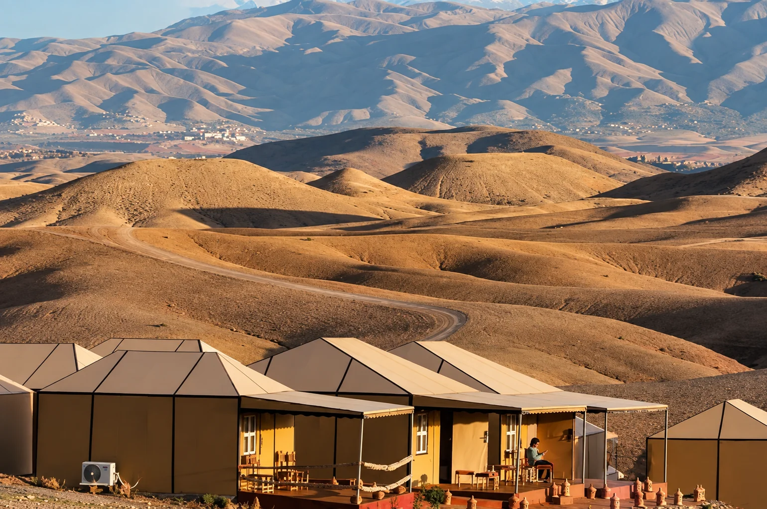 Camp tents overlooking the rocky Agafay desert near Marrakech