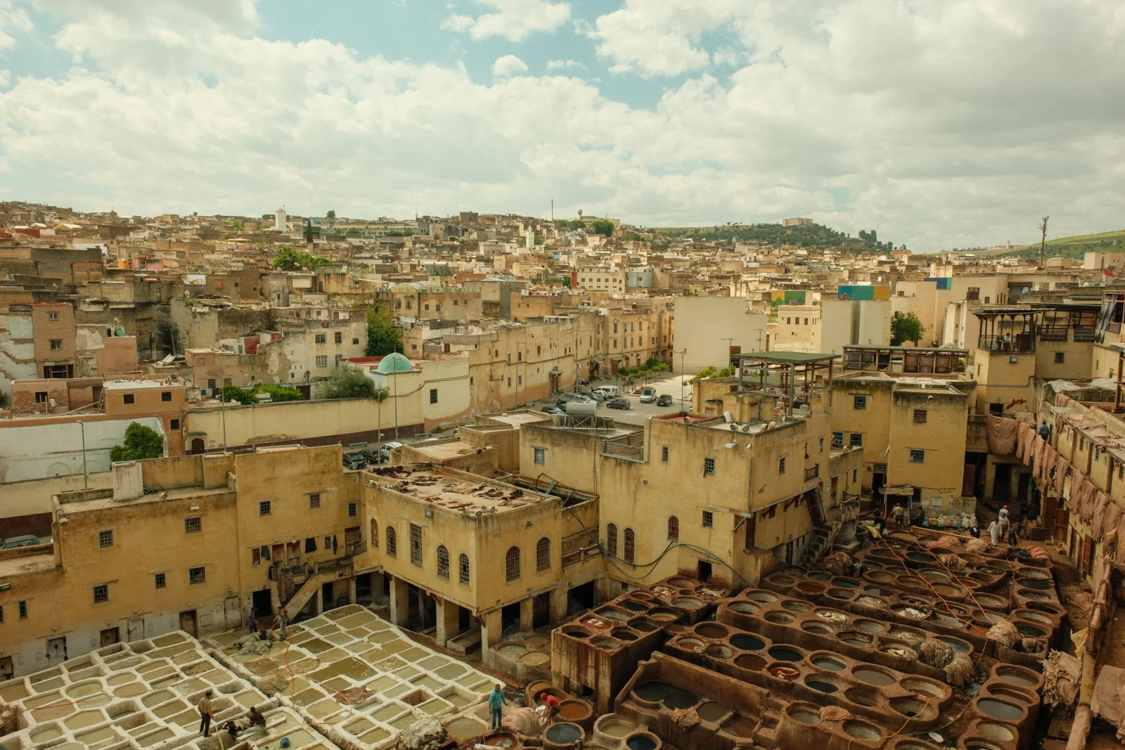 Traditional leather tanning vats surrounded by the Fes medina